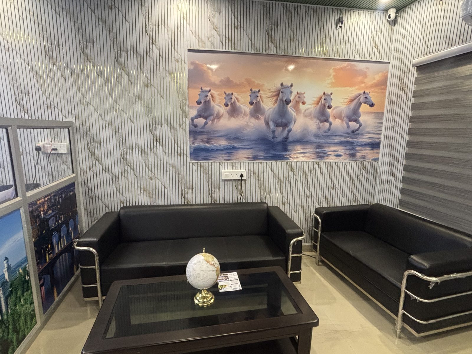 Client waiting lounge with leather sofas at the Apex HR Consultancy office