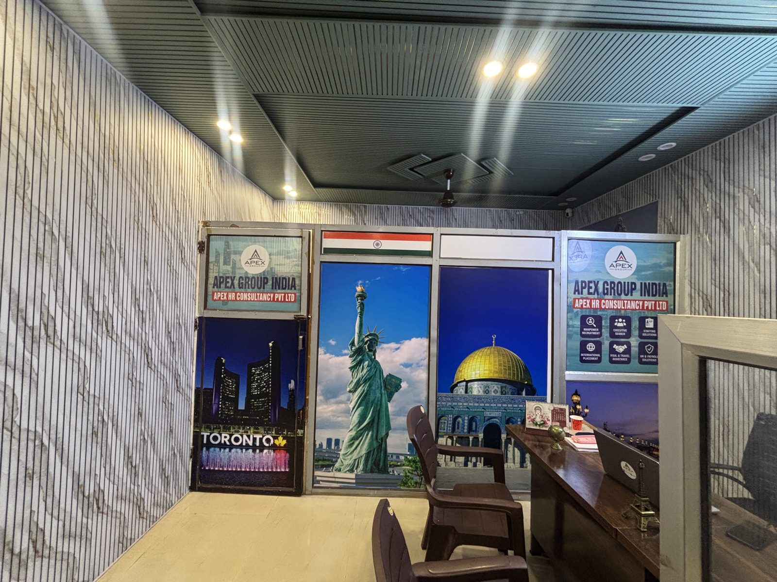 Apex Group India reception area with branded panels and consultant desk